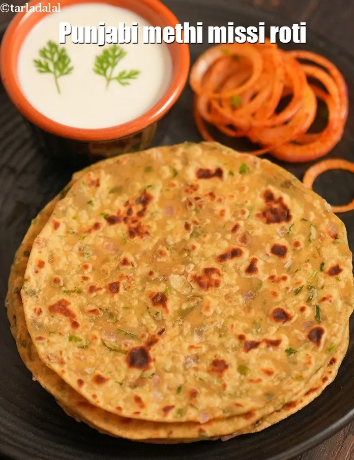 स्टेप 19 – <strong>मेथी की मिस्सी रोटी को</strong>&nbsp;तुरंत मक्खन के साथ&nbsp;परोसें ।