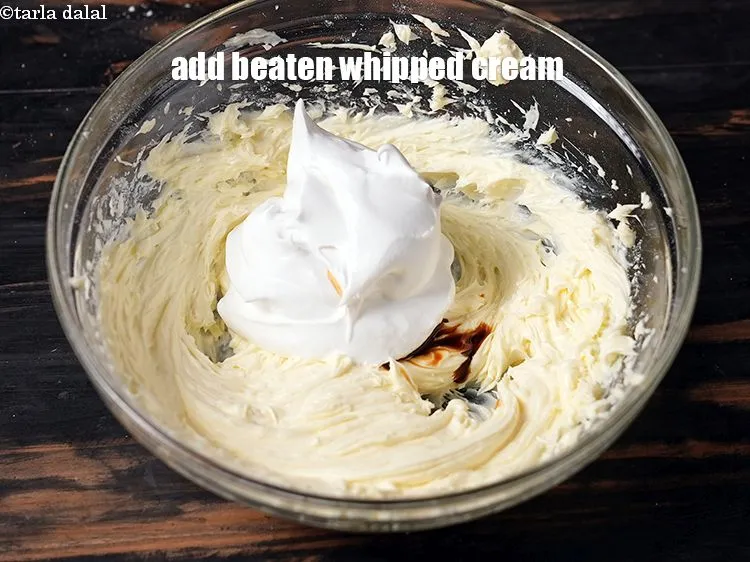 Step 20 – Add 1/3 cup&nbsp;<a href="https://www.tarladalal.com/glossary-beaten-whipped-cream-1948i">beaten whipped cream</a>.