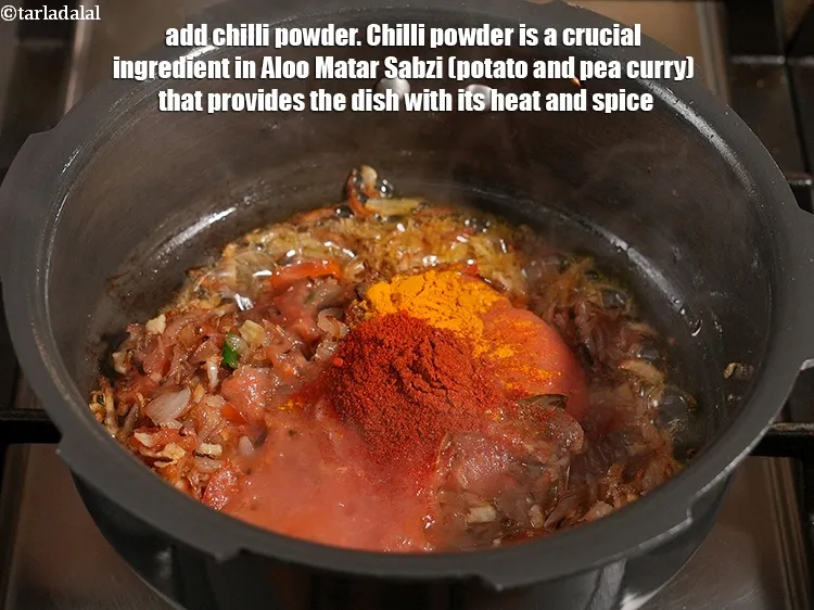 Step 19 – Add 1&frac12; tsp <a href="https://www.tarladalal.com/glossary-chilli-powder-red-chilli-powder-339i">chilli powder</a>. Chilli powder is a crucial ingredient in Aloo Matar …