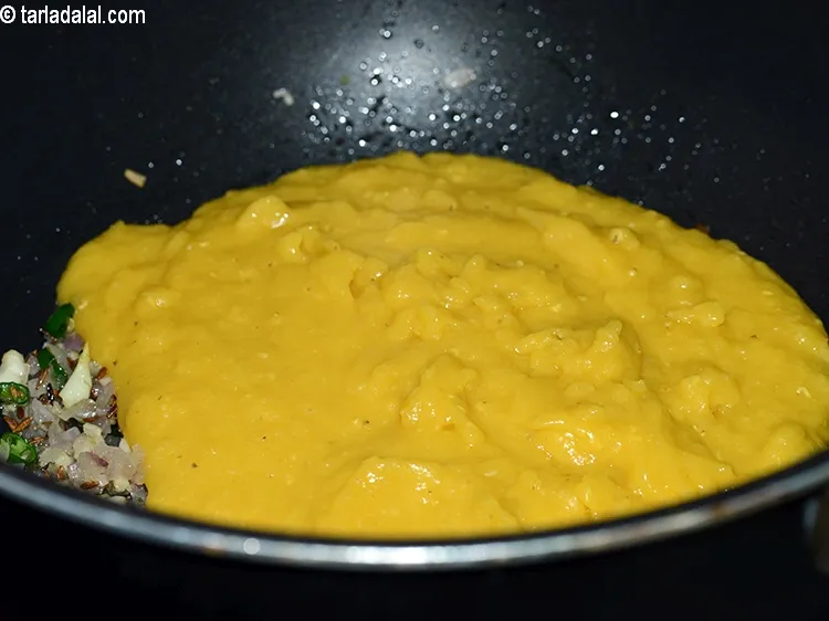 Step 19 – Add the cooked dal.