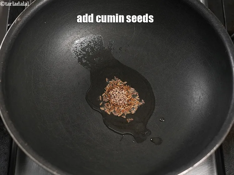 Step 20 – Add &frac12; tsp <a href="https://www.tarladalal.com/glossary-cumin-seeds-jeera-zeera-381i">cumin seeds (jeera)</a>.