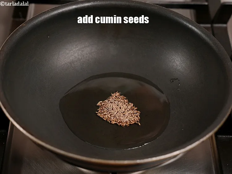 Step 19 – Add 1 tsp <a href="https://www.tarladalal.com/glossary-cumin-seeds-jeera-zeera-381i">cumin seeds (jeera)</a>.
