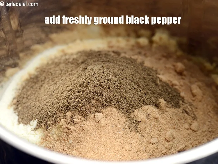 Step 19 – Add 1 tsp&nbsp;<a href="https://www.tarladalal.com/glossary-freshly-ground-black-pepper-kalimirch-powder-kali-mirch-ka-powder-567i">freshly ground black pepper (kalimirch)</a>.