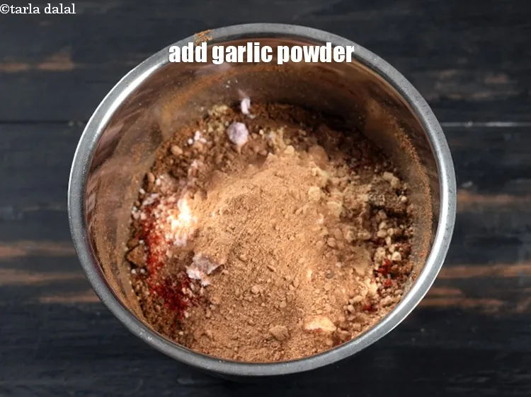 Step 19 – Add 2 tsp <a href="https://www.tarladalal.com/glossary-garlic-powder-lehsun-ka-powder-lahsun-ka-powder-351i">garlic (lehsun) powder</a>.