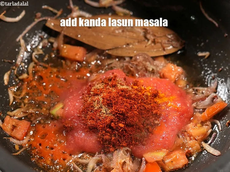 Step 19 – Add &frac12; tbsp kanda lasun masala.
