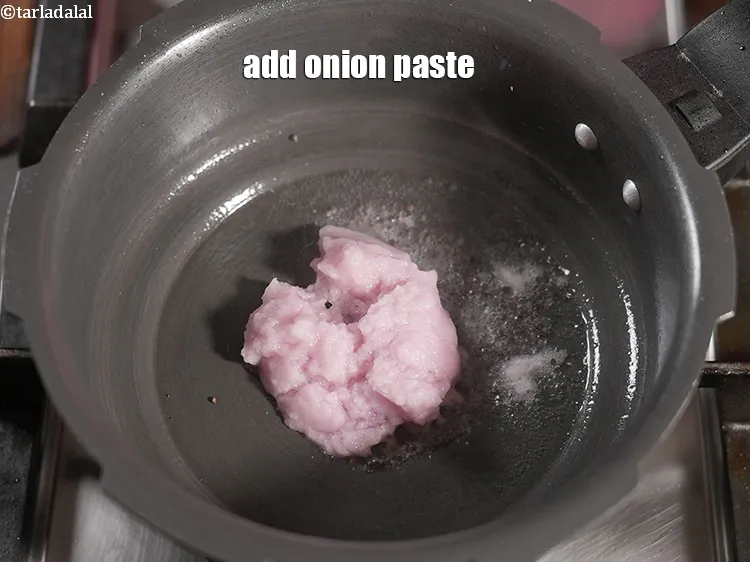Step 19 – Add &frac14; cup <a href="https://www.tarladalal.com/glossary-onion-paste-pyaaz-ki-paste-555i">onion paste</a>.