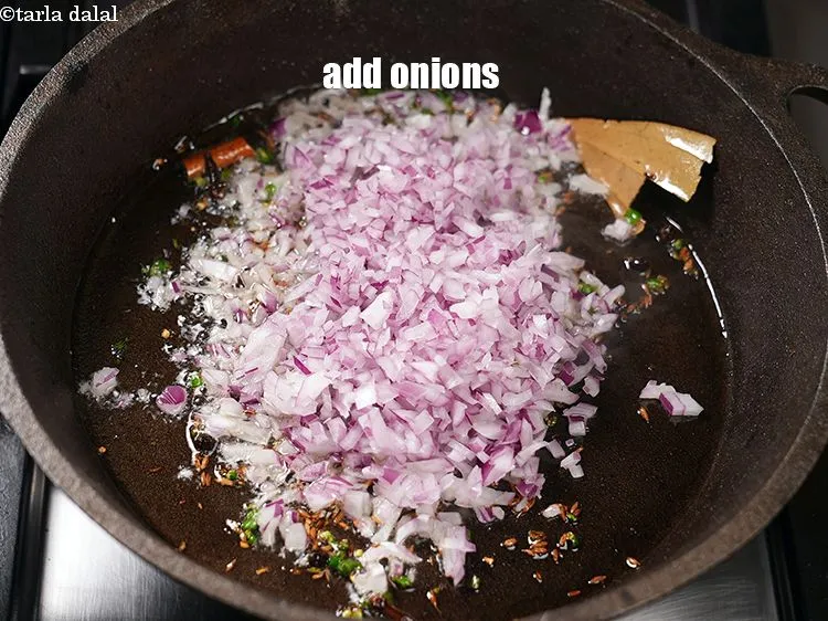 Step 26 – Add &frac34; cup finely chopped onions.