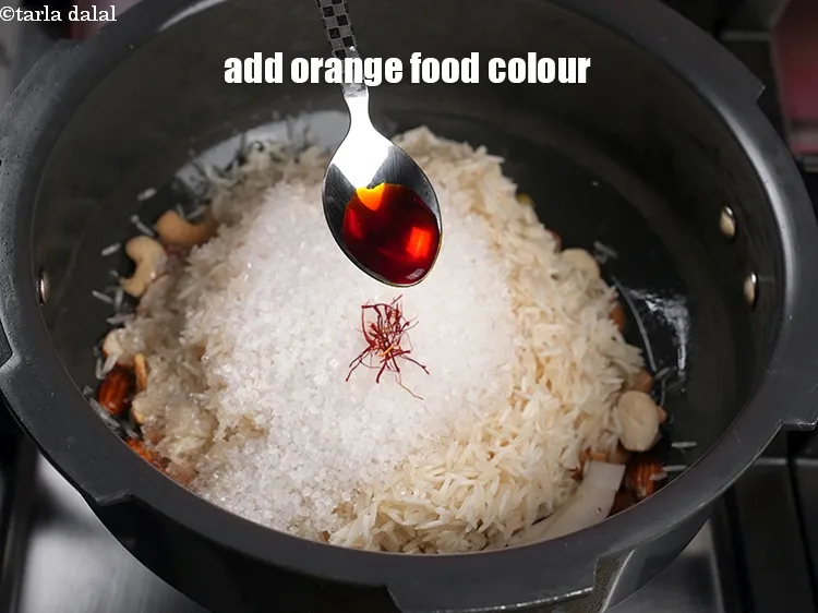 Step 19 – Add &frac14; tsp orange food colour.