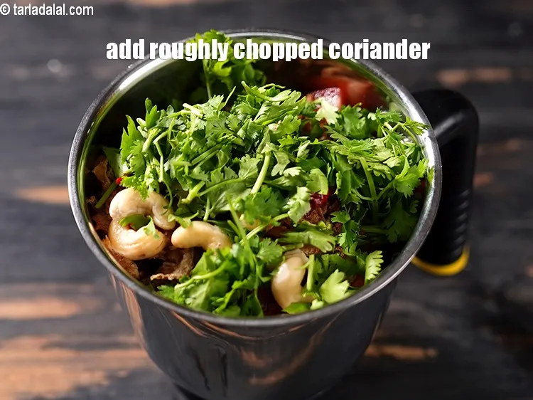 Step 26 – Add &frac14; cup roughly chopped coriander.