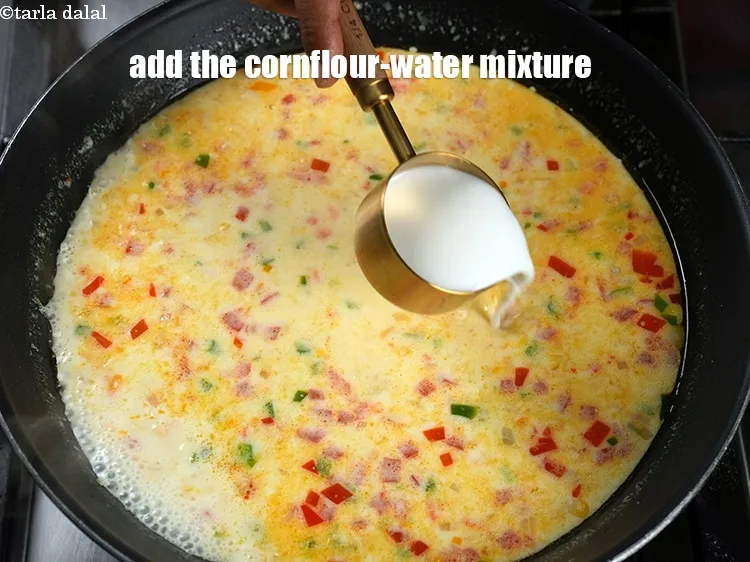 Step 19 – Add the prepared cornflour-water mixture.