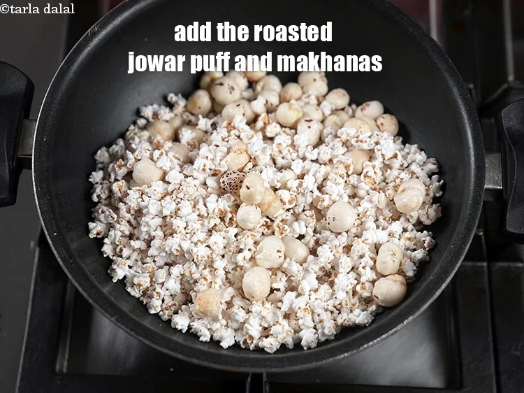 Step 19 – Add the roasted jowar puff and makhanas.