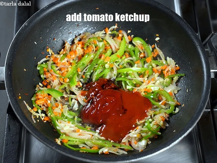 Step 24 – Add 1 tbsp tomato ketchup.&nbsp;