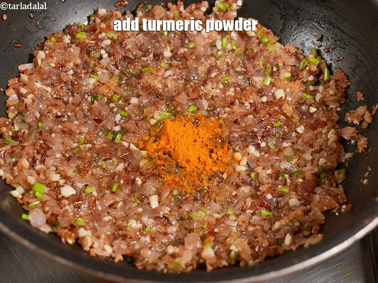 Step 19 – Add &frac12; tsp <a href="https://www.tarladalal.com/glossary-turmeric-powder-haldi-645i">turmeric powder (haldi)</a>.&nbsp;