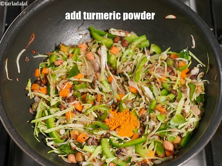 Step 22 – Add &frac12; tsp <a href="https://www.tarladalal.com/glossary-turmeric-powder-haldi-645i">turmeric powder (haldi)</a>.&nbsp;