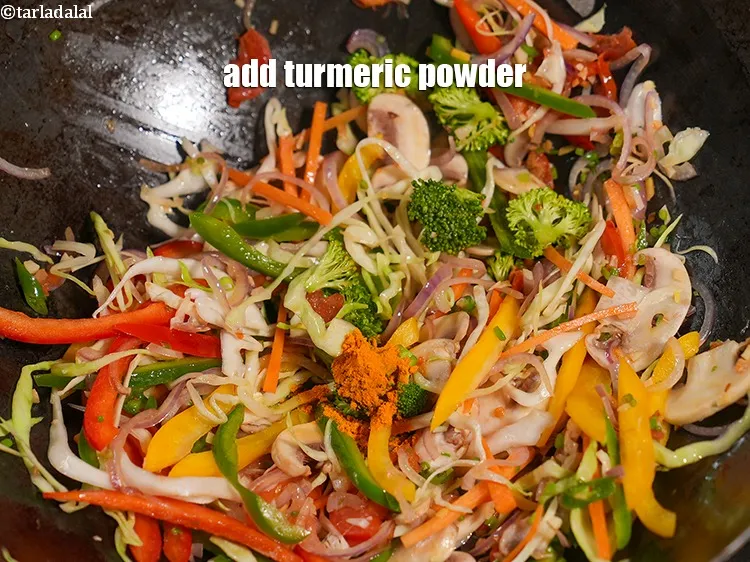 Step 22 – Add &frac14; tsp <a href="https://www.tarladalal.com/glossary-turmeric-powder-haldi-645i">turmeric powder (haldi)</a>.