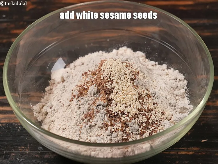 Step 18 – Add white sesame seeds.