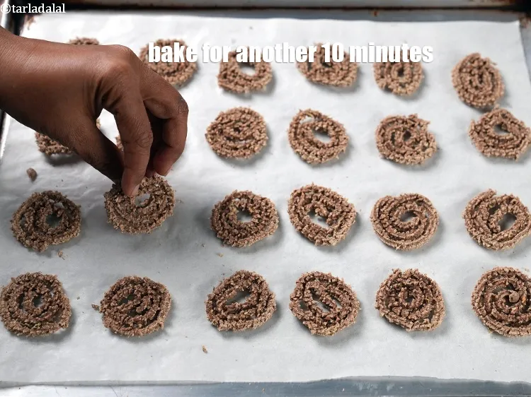 Step 19 – Remove and turn all the chaklis and again bake for another 10 minutes.