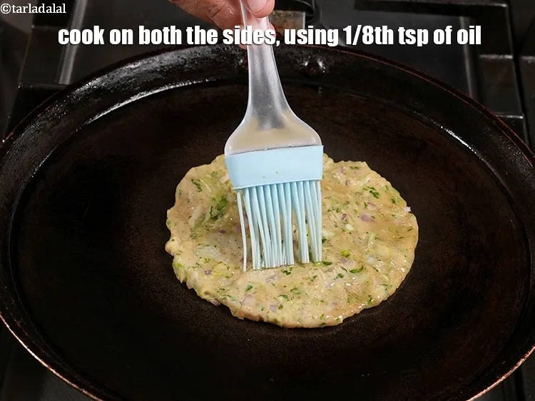 Step 18 – <meta charset="UTF-8" /> Serve the&nbsp;<strong>nutritious thalipeeth &nbsp;|&nbsp;healthy multigrain thalipeeth&nbsp;|&nbsp;jowar bajra thalipeeth&nbsp;|&nbsp;thalipeeth for diabetes&nbsp;|</strong> immediately with …