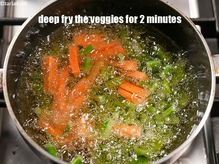Step 20 – Deep fry the veggies for 2 minutes. Remove in a plate and keep aside.&nbsp;