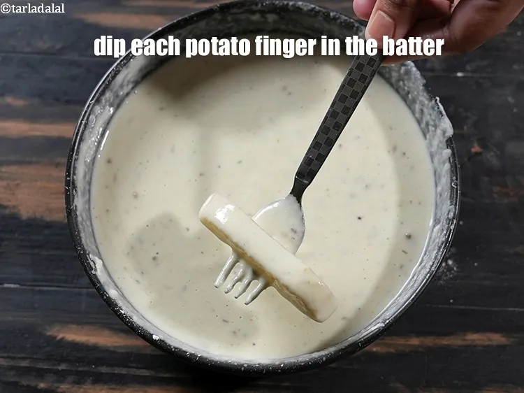 Step 19 – Dip each potato finger in the batter.