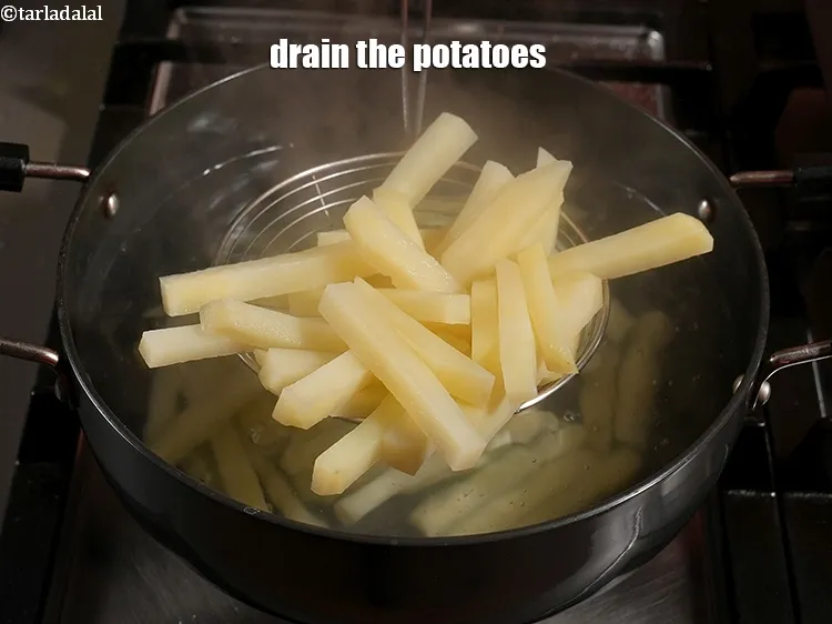 Step 19 – Drain the potatoes.