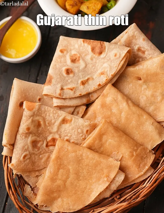 स्टेप 20 – <strong>पड़वाली रोटी रेसिपी&nbsp;|&nbsp;गुजराती पतली रोटी&nbsp;|&nbsp;पैड वाली रोटी&nbsp;|&nbsp;बेपड़ी रोटी&nbsp;|&nbsp;परतदार रोटी&nbsp;|</strong>तुरंत परोसें।