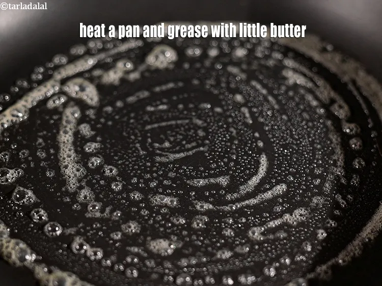 Step 19 – Heat a nonstick pan, and grease it with little butter.