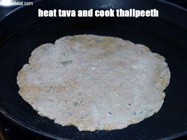 Step 19 – Heat a non-stick tava (griddle).