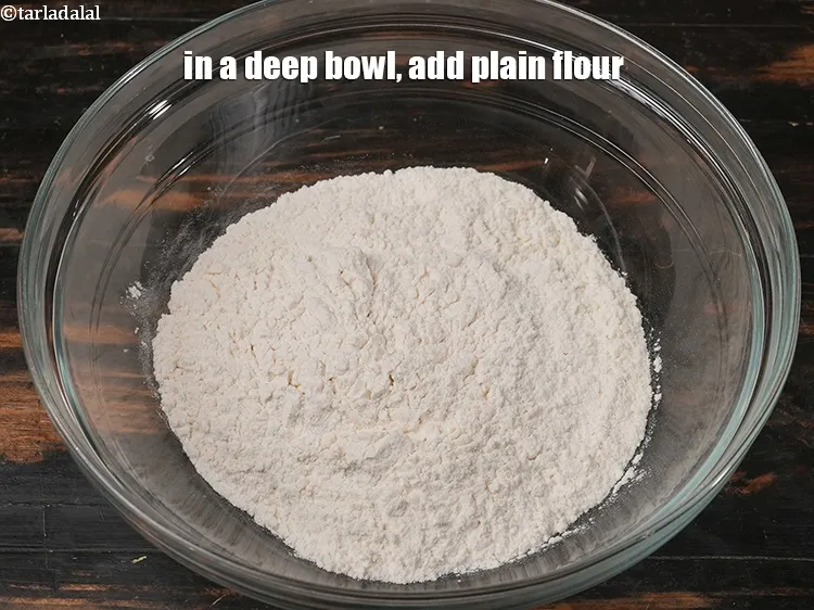 Step 20 – In a deep bowl, add 2 cups <a href="https://www.tarladalal.com/glossary-plain-flour-maida-188i">plain flour (maida)</a>.