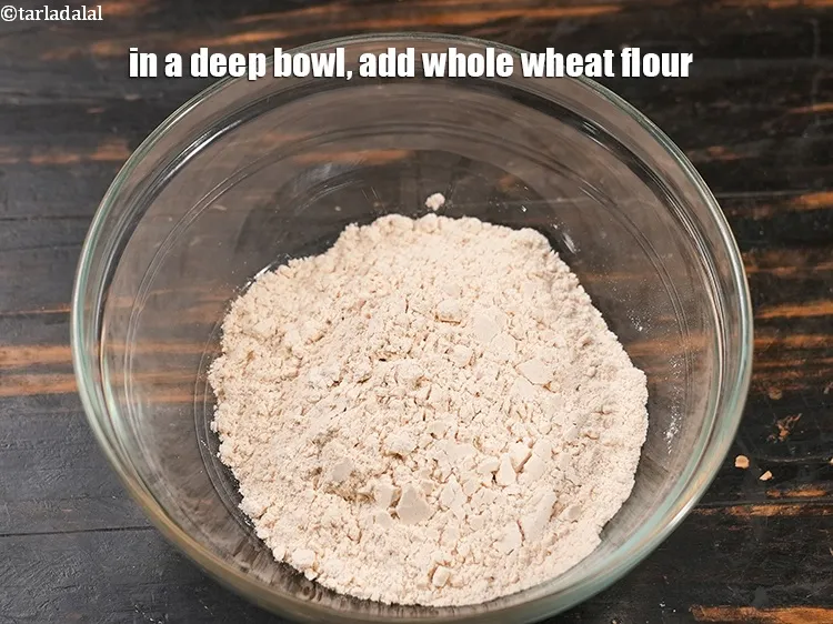 Step 19 – In a deep bowl, add 1 cup <a href="https://www.tarladalal.com/glossary-whole-wheat-flour-gehun-ka-atta-gehun-ka-aata-429i">whole wheat flour (gehun ka atta)</a>.