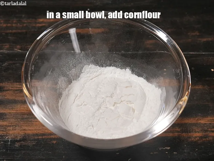 Step 19 – In a small bowl, add 2 tbsp <a href="https://www.tarladalal.com/glossary-cornflour-cornstarch-maize-starch-corn-flour-112i">cornflour</a>.