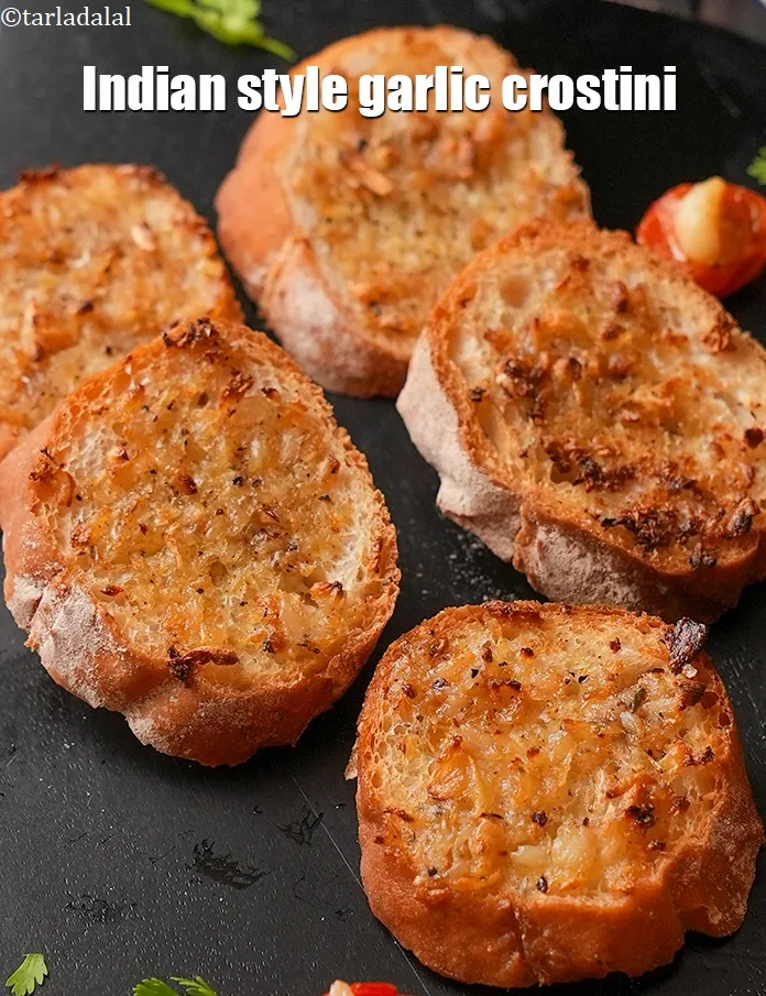 Step 19 – Serve <strong>roasted garlic crostini recipe | Indian style garlic crostini | garlic bruschetta |</strong> immediately.
