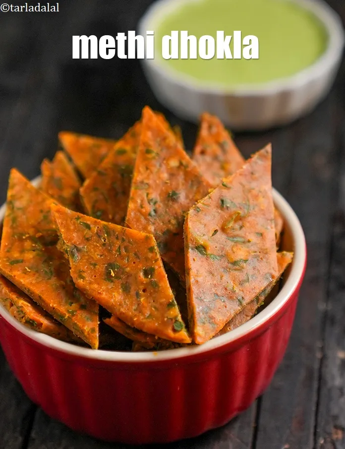 Step 19 – Serve <strong>garlicky methi dhokli recipe | methi dhokla | healthy methi lehsun dhokli |&nbsp;</strong>immediately.