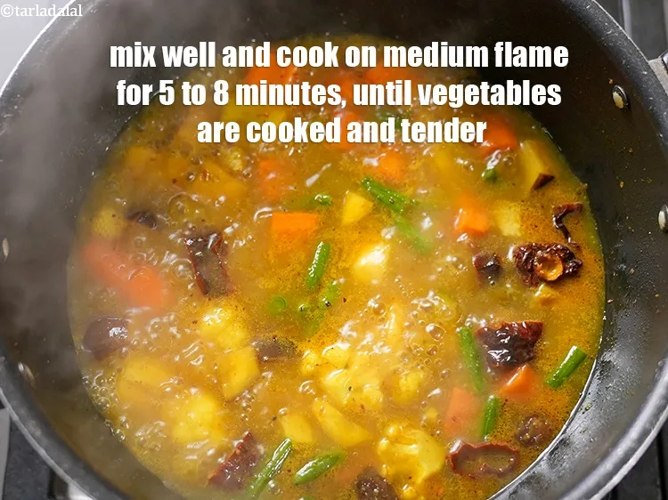 Step 19 – Mix well and cook on medium flame for 5 to 8 minutes, until vegetables are …