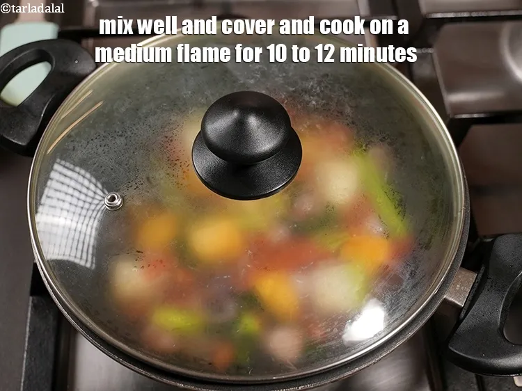Step 19 – Mix well and cover and cook on a medium flame for 10 to 12 minutes.