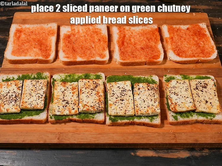 Step 19 – Place 2 <a href="https://www.tarladalal.com/glossary-sliced-paneer-996i">sliced paneer (cottage cheese)</a> on green chutney applied bread slices.