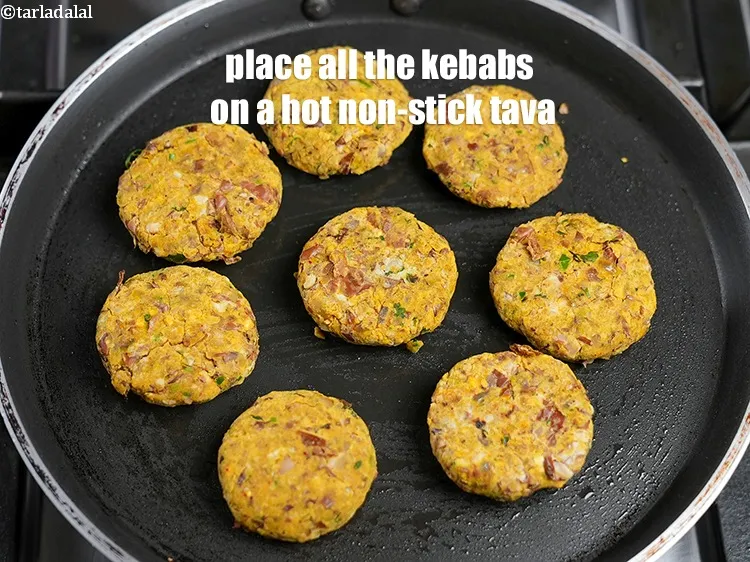 Step 19 – Place all the kebabs on a hot non-stick tava (griddle).
