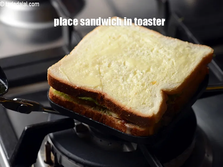 Step 20 – Place the sandwich in the sandwich toaster.