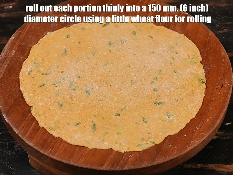 Step 19 – Roll out each portion thinly into a 150 mm. (6 inch) diameter circle using a …