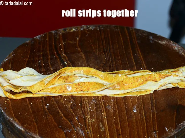 Step 19 – Roll the strips together.