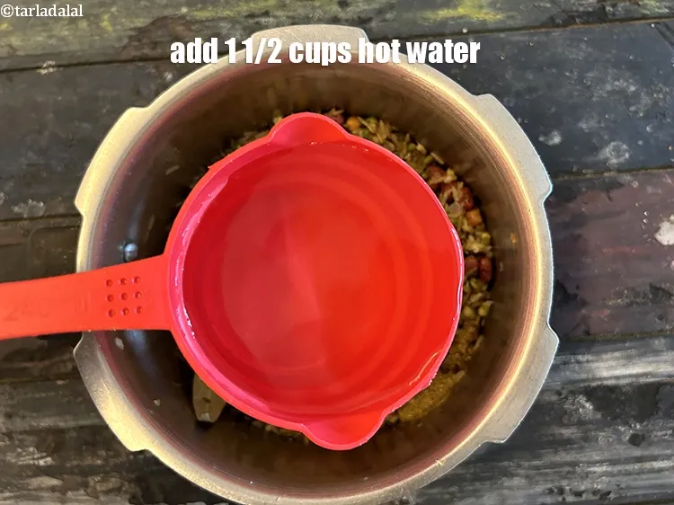 Step 27 – Add&nbsp;<strong>1 1/2 cups of hot water.</strong>