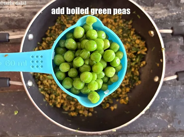 Step 24 – Add&nbsp;<meta charset="UTF-8" />1/2 cup&nbsp;<a href="glossary-boiled-green-peas-1078i">boiled green peas</a>.