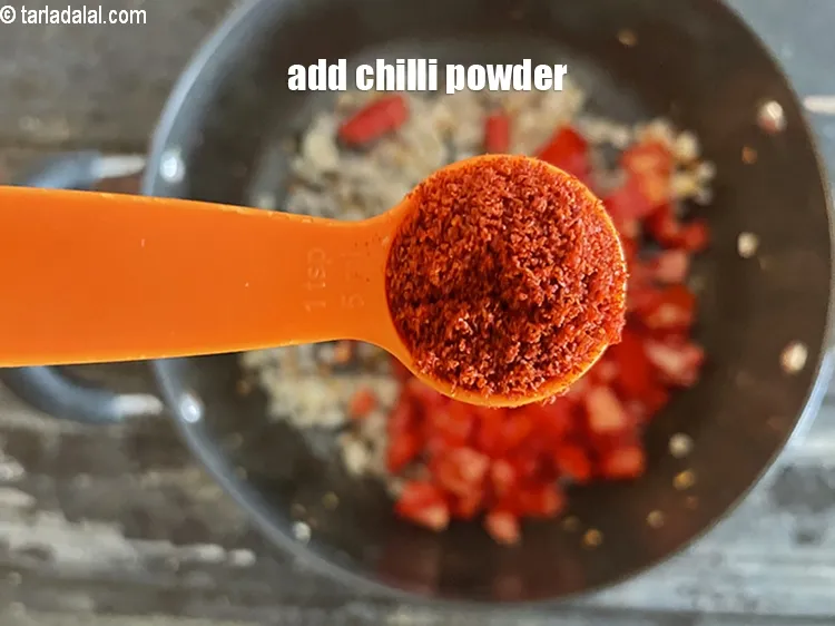 Step 29 – Add&nbsp;<meta charset="UTF-8" />1 tsp&nbsp;<a href="glossary-chilli-powder-red-chilli-powder-339i">chilli powder</a>.