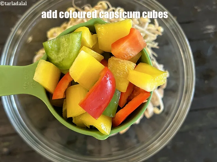 Step 26 – Add&nbsp;<meta charset="UTF-8" />1/2 cup&nbsp;<a href="glossary-chopped-coloured-capsicum-2800i">chopped coloured capsicum</a>.