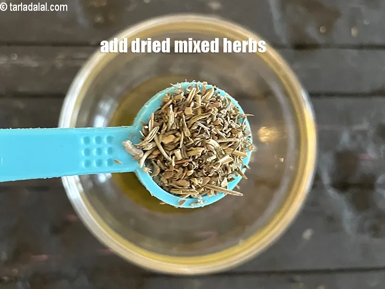 Step 19 – Add&nbsp;<meta charset="UTF-8" />1/2 tsp&nbsp;<a href="glossary-dried-mixed-herbs-466i">dried mixed herbs</a>.
