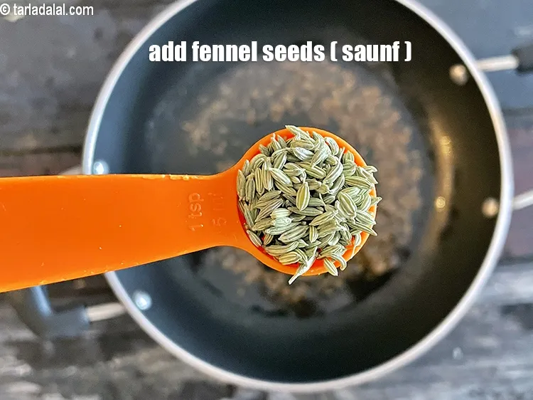 Step 24 – Add&nbsp;<meta charset="UTF-8" />1 tsp&nbsp;<a href="glossary-fennel-seeds-saunf-sauf-410i">fennel seeds (saunf)</a>.