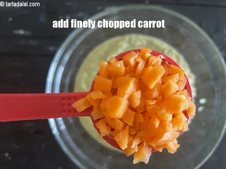 Step 19 – Add&nbsp;<meta charset="UTF-8" />2 tbsp&nbsp;finely&nbsp;<a href="glossary-chopped-carrot-798i">chopped carrot</a>.