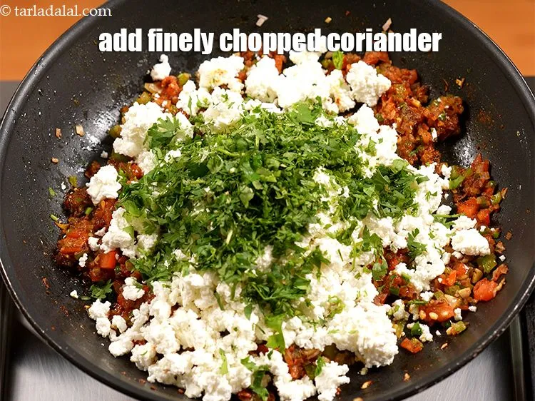 Step 21 – Add 2 tbsp finely&nbsp;<a href="https://www.tarladalal.com/glossary-chopped-coriander-783i">chopped coriander (dhania)</a>.