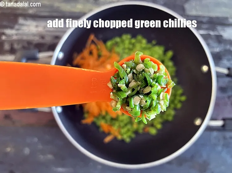 Step 27 – Add 1&nbsp;tsp&nbsp;finely&nbsp;<a href="glossary-chopped-green-chilli-820i">chopped green chillies</a>.
