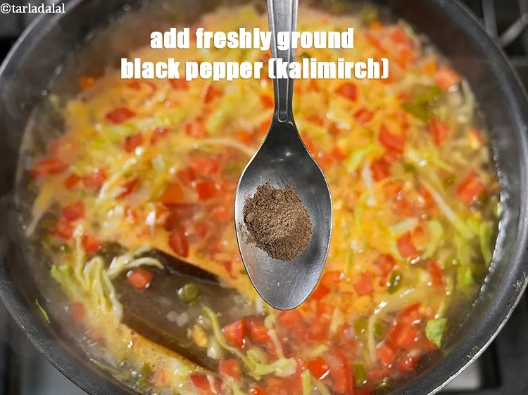 Step 25 – Add&nbsp;<meta charset="UTF-8" /><a href="glossary-freshly-ground-black-pepper-kalimirch-powder-kali-mirch-ka-powder-567i">freshly ground black pepper (kalimirch)&nbsp;</a> to taste.